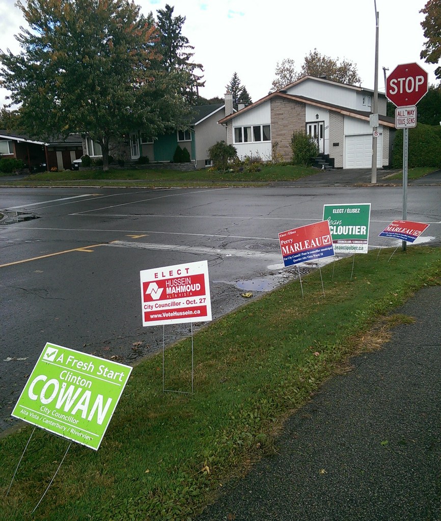 Signs for City Council candidates in Alta Vista ward.