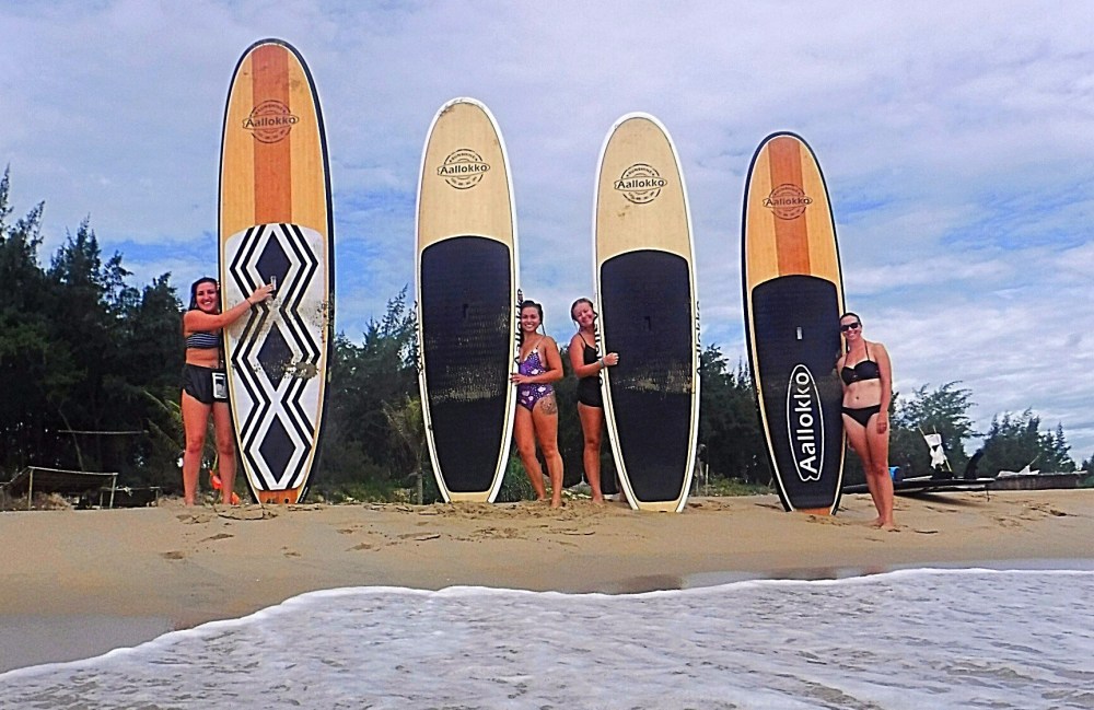 Girls with paddleboards, Hoi An Vietnam